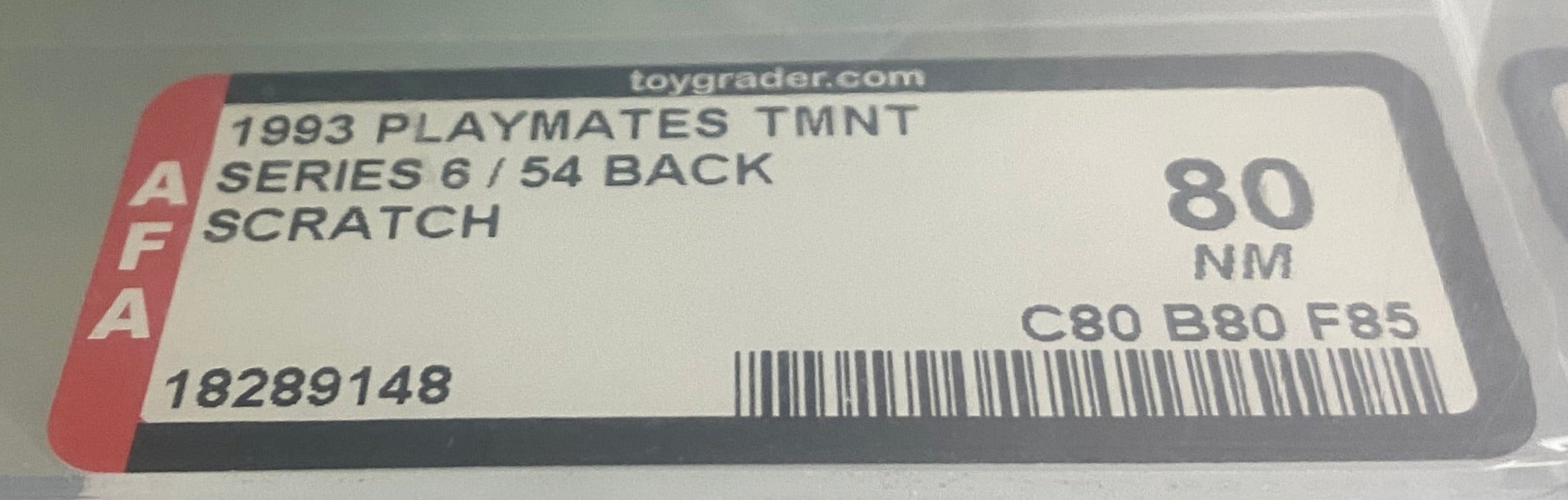 Teenage Mutant Ninja Turtles Scratch boxed figure AFA graded 80. Label photo close-up.